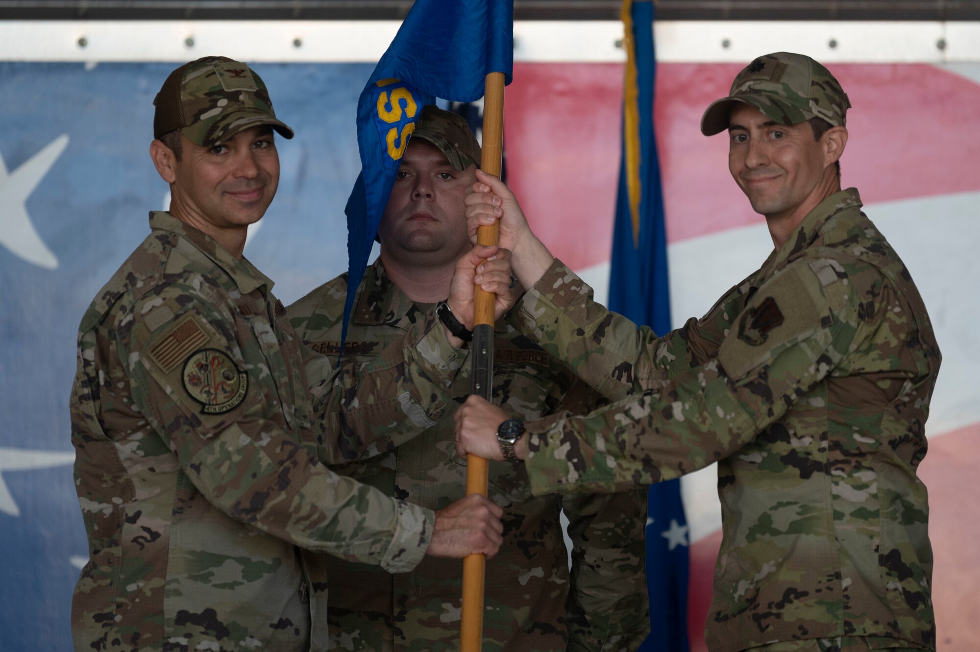 Lt. Col. Stephen Keefer, incoming 4th Operations Support Squadron commander, assumes command of the 4th OSS during a change of command ceremony at Seymour Johnson Air Force Base, North Carolina, April 15, 2022. Keefer has flown more than 800 combat hours in support of Operations ENDURING FREEDOM, INHERENT RESOLVE and SPARTAN SHIELD. (U.S. Air Force photo by Senior Airman Kevin Holloway)