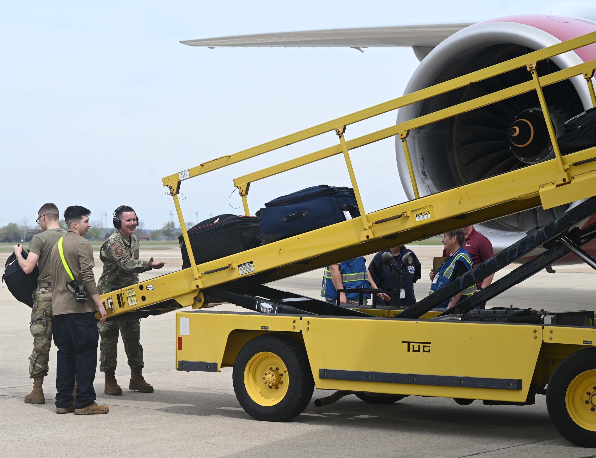 Langley Airmen unload plane