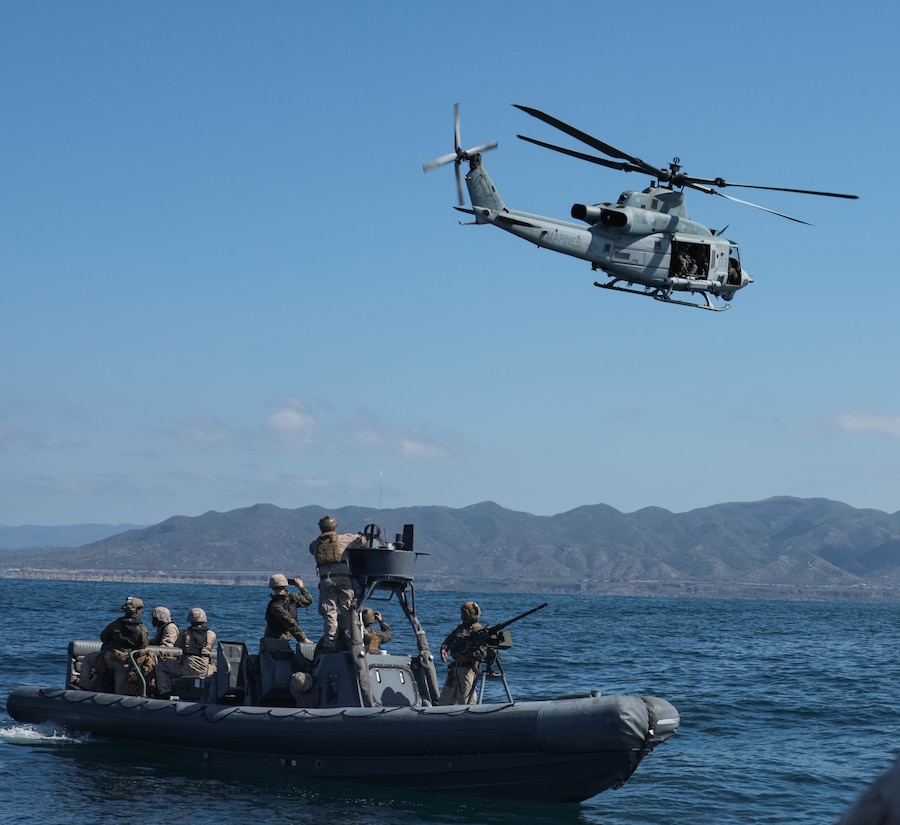 A U.S. Marine Corps UH-1Y Venom performs air operations during Maritime Domain Awareness Integration Exercise off the coast of Camp Pendleton, California, March 30, 2022. The purpose of this training evolution was to increase the unit's proficiency in utilizing joint terminal attack controllers in the maritime domain, demonstrating littoral capabilities for future deployments. (U.S. Marine Corps photo by Lance Cpl. Brayden Daniel)