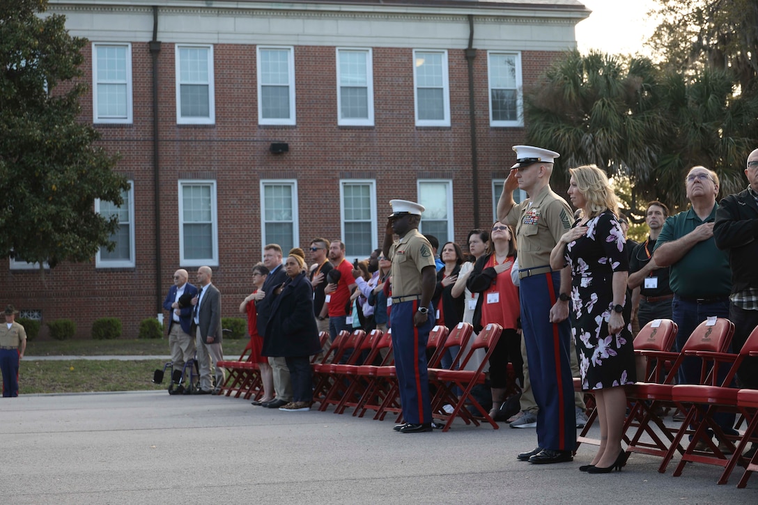 U.S. Marine Corps Sgt. Maj. Troy E. Black, the 19th Sergeant Major of the Marine Corps, poses for a photo with veterans at Marine Corps Recruit Depot Parris Island, South Carolina, April 7, 2022. The sergeant major of the Marine Corps and his spouse, retired First Sgt. Stacie Black were the parade reviewing officials for Lima Company graduation ceremony. Marine Corps Recruit Depot Parris Island has transformed young men and women into Marines since 1915. (U.S. Marine Corps photo by Staff Sgt. Victoria Ross)