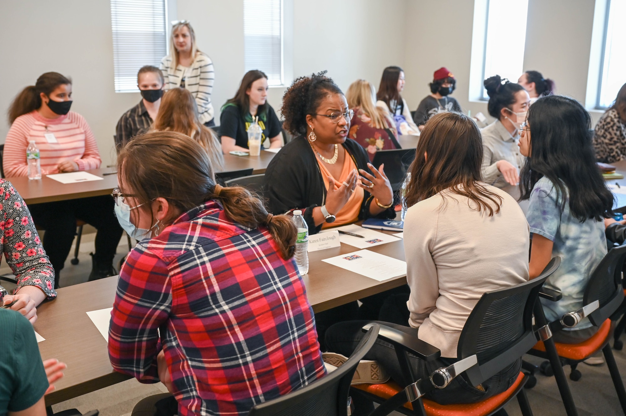 Women engineers and scientists from Hill Air Force Base, Utah, meet with female high school students during a Science, Technology, Engineering and Math (STEM) event March 30, 2022.