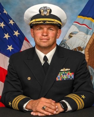 Commander Dustin T. Lonero