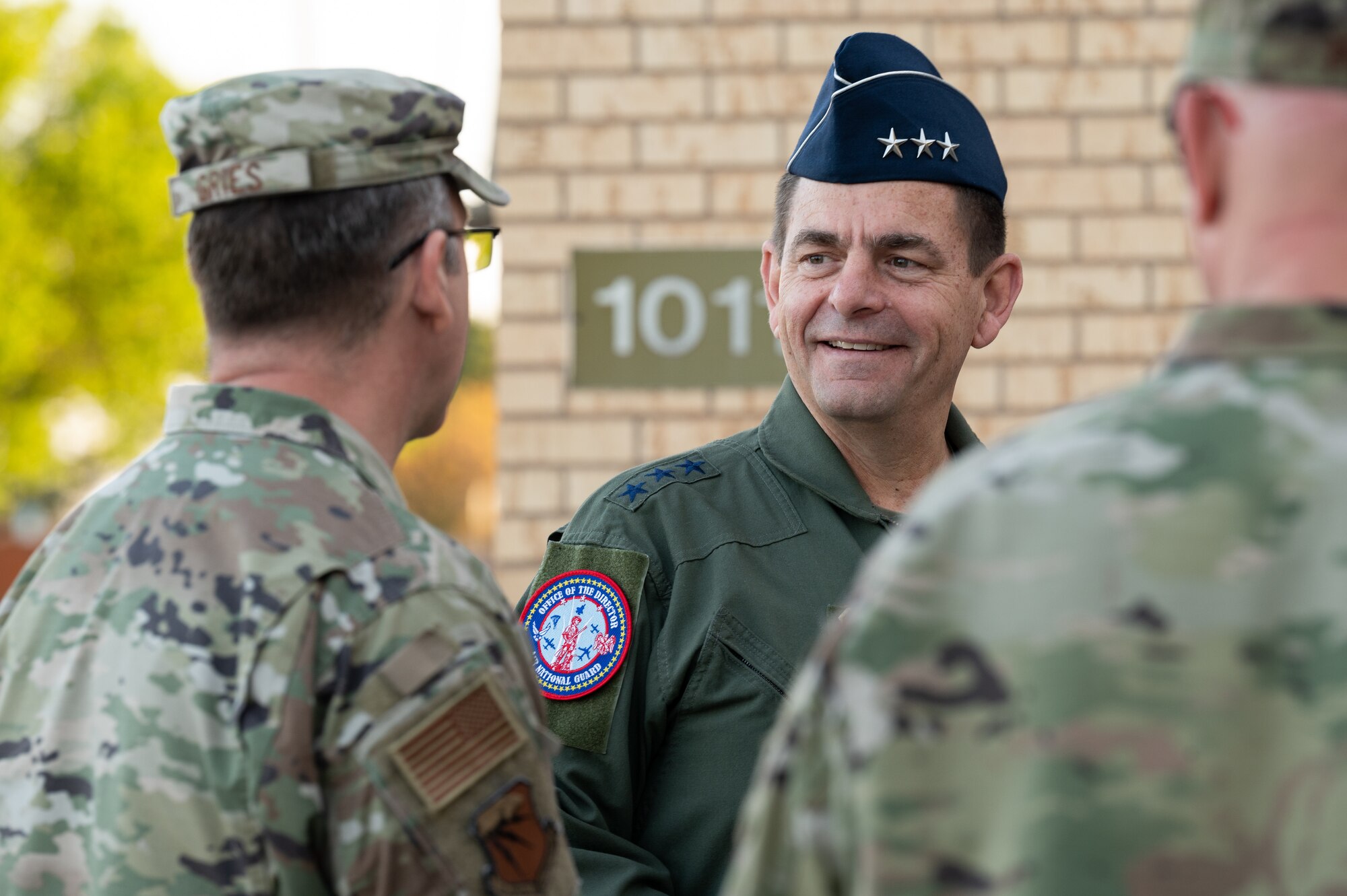 From left: U.S. Air Force Col. Christopher Gries, commander, 137th Special Operations Wing (SOW), Oklahoma National Guard (OKNG), speaks to Lt. Gen. Michael A. Loh, director, Air National Guard (ANG), at Will Rogers ANG Base in Oklahoma City, April 14, 2022.
