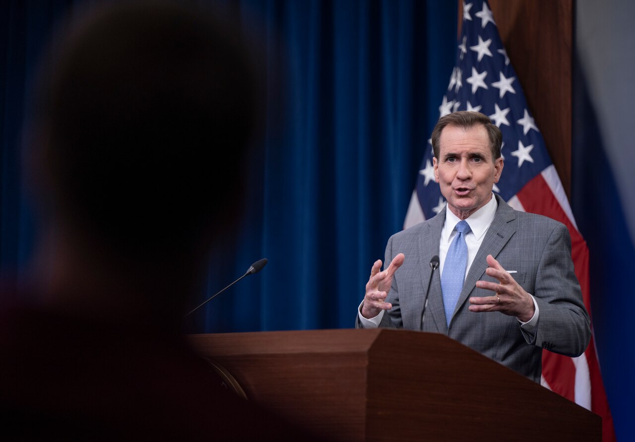 A man speaks to an audience.