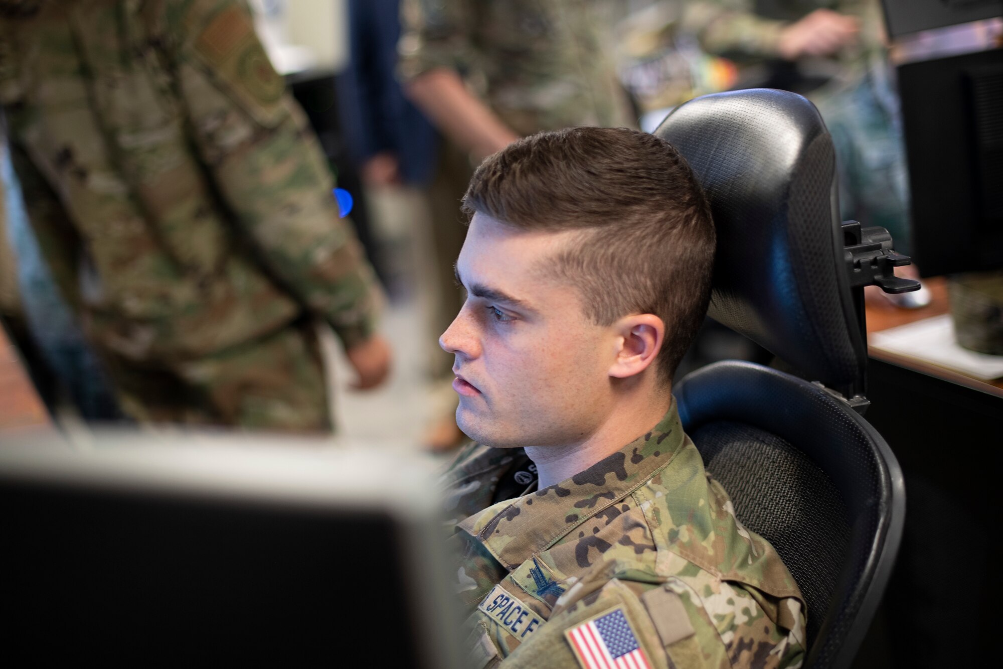 U.S. Space Force 1st Lt Devan Tisdale 2nd Space Warning Squadron processes missile events during SPACE FLAG 22-2. During this iteration of SPACE FLAG, missile warning operators like Lt Tisdale were able to use their own trainer, for the first time allowing them to exercise like they fight. (U.S. Space Force photo by Ms. Judi Tomich)