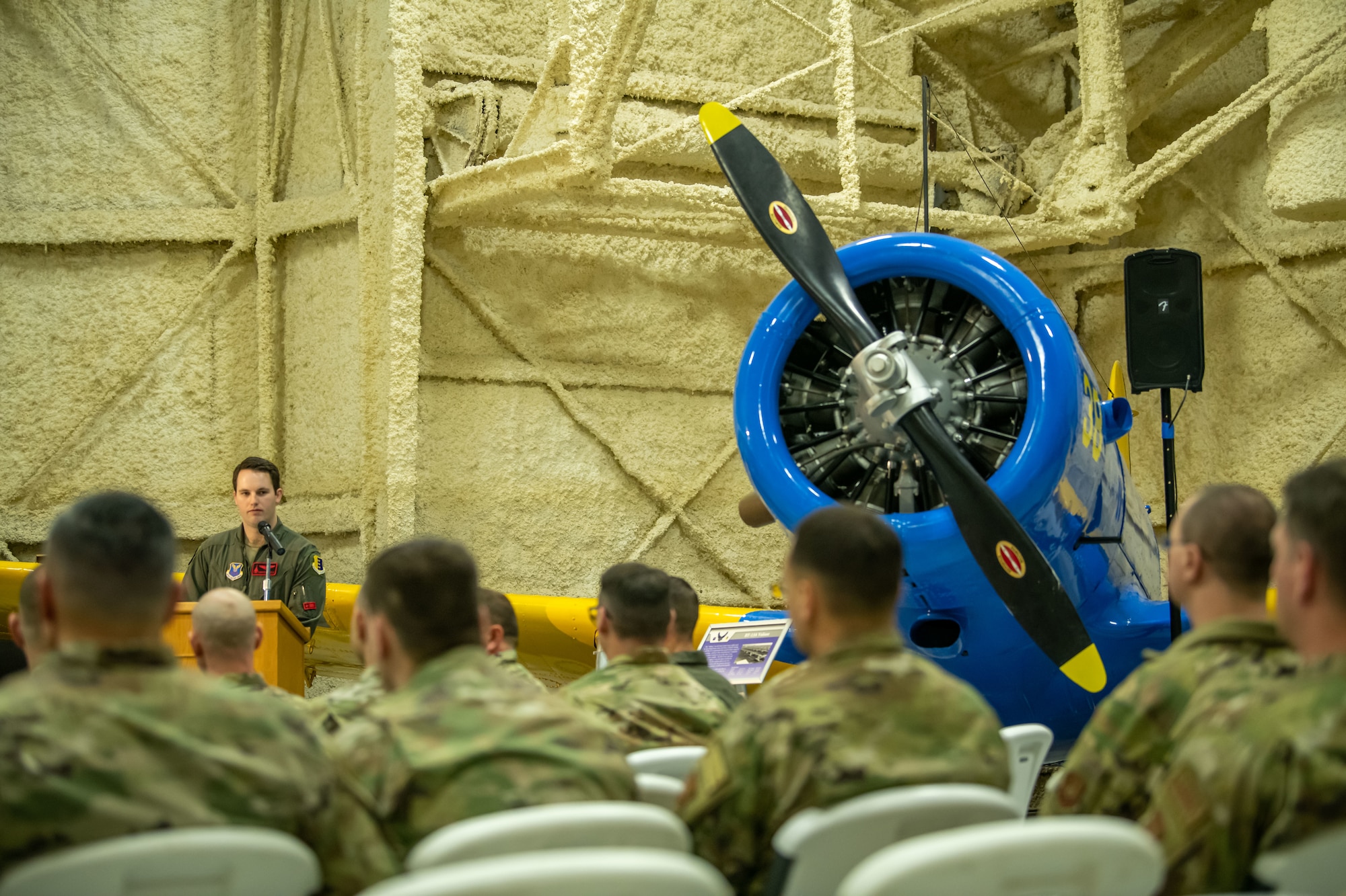 1st Lt. Cameron Sorrells, 34th Bomb Squadron pilot, speaks to Ellsworth Air Force Base Airmen as part of a dedication ceremony at the South Dakota Air and Space Museum, April 18, 2022.