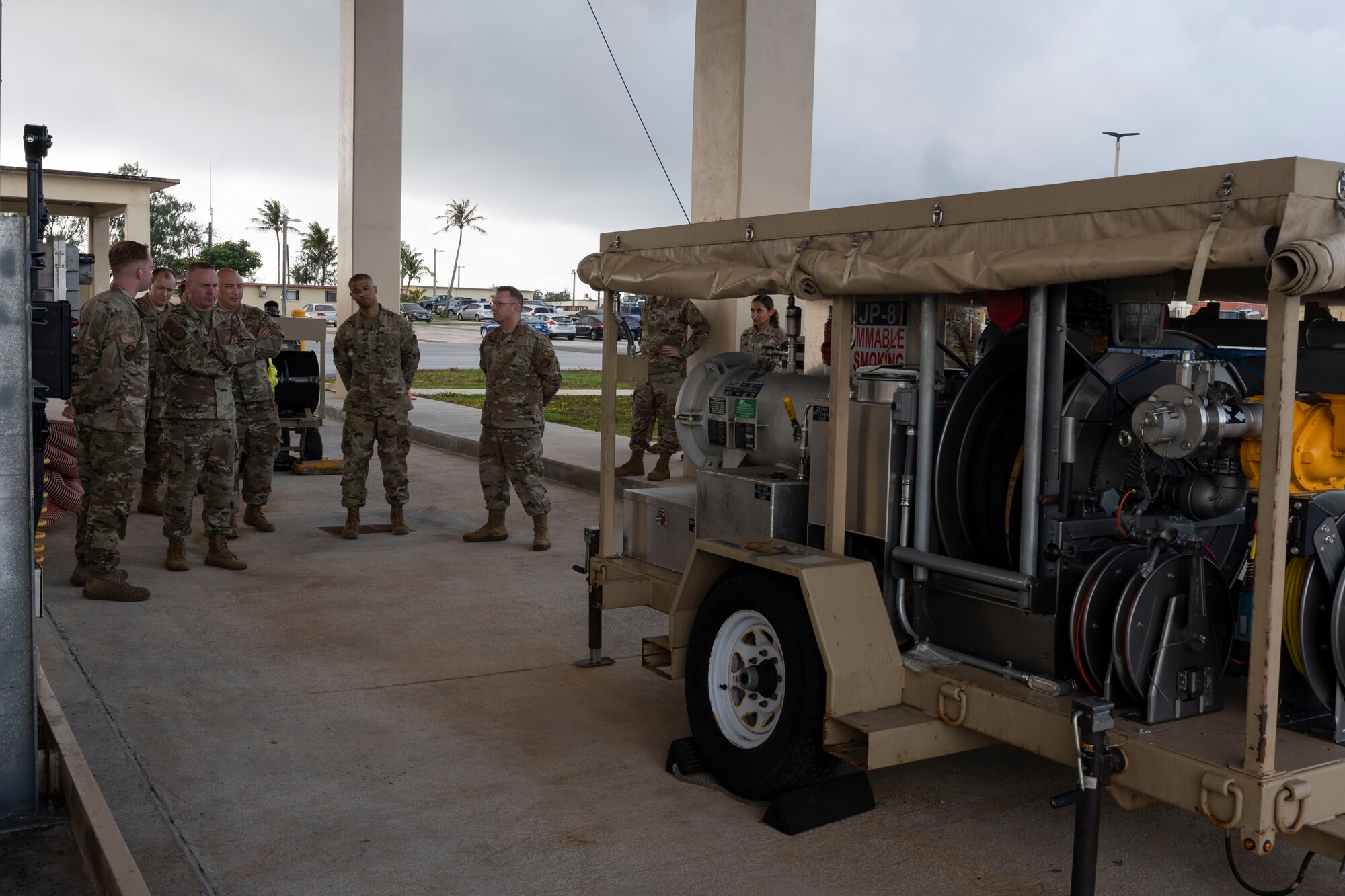 U.S. Air Force Chief Master Sgt. David R. Wolfe, Pacific Air Forces command chief, is briefed on the capabilities of a fuels Starcart by Airmen with the 36th Logistics Readiness Squadron at Andersen Air Force Base, Guam, April 14, 2022.