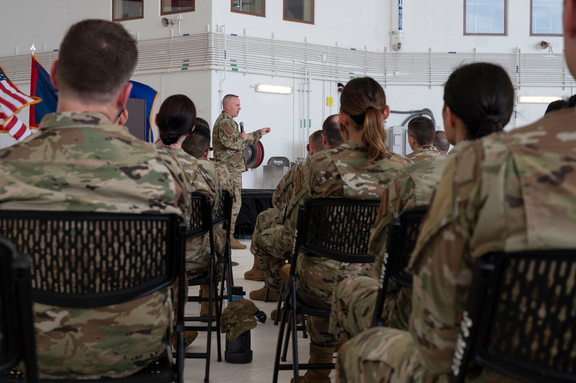 U.S. Air Force Chief Master Sgt. David R. Wolfe, Pacific Air Forces command chief, speaks to Airmen during an all-call at Andersen Air Force Base, Guam, April 14, 2022.