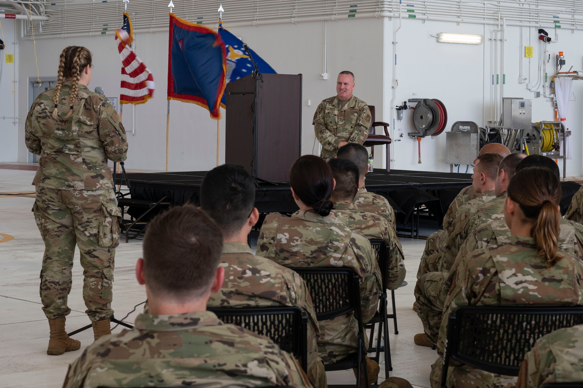 U.S. Air Force Chief Master Sgt. David R. Wolfe, Pacific Air Forces command chief, listens as an Airman asks him a question during an all-call at Andersen Air Force Base, Guam, April 14, 2022.