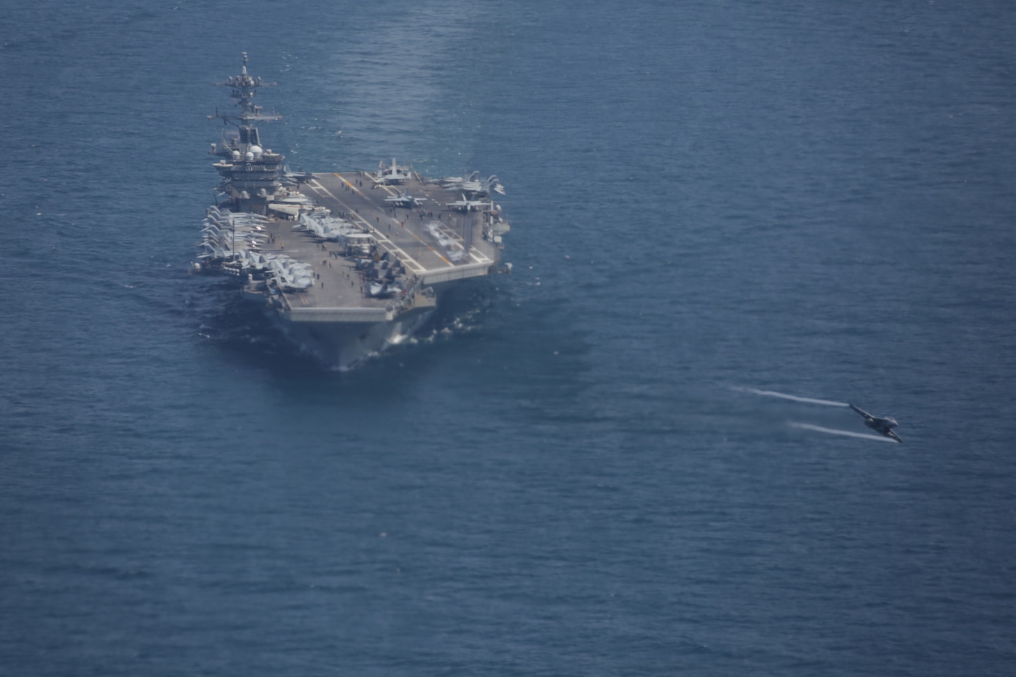 SEA OF JAPAN (April 12, 2022) An F/A-18E Super Hornet, assigned to the “Vigilantes” of Strike Fighter Squadron (VFA) 151, launches from the flight deck of the Nimitz-class aircraft carrier USS Abraham Lincoln during a U.S.-Japan bilateral exercise. During bilateral exercises between Abraham Lincoln Carrier Strike Group and Japan Maritime Self-Defense Force, the two navies strengthen all-domain awareness and maneuvers across a distributed maritime environment. Bilateral operations like this one reassure our allies and partners of the U.S. commitment to maintaining a free and open Indo-Pacific region. (U.S. Navy photo by Mass Communication Specialist Seaman Aleksandr Freutel)