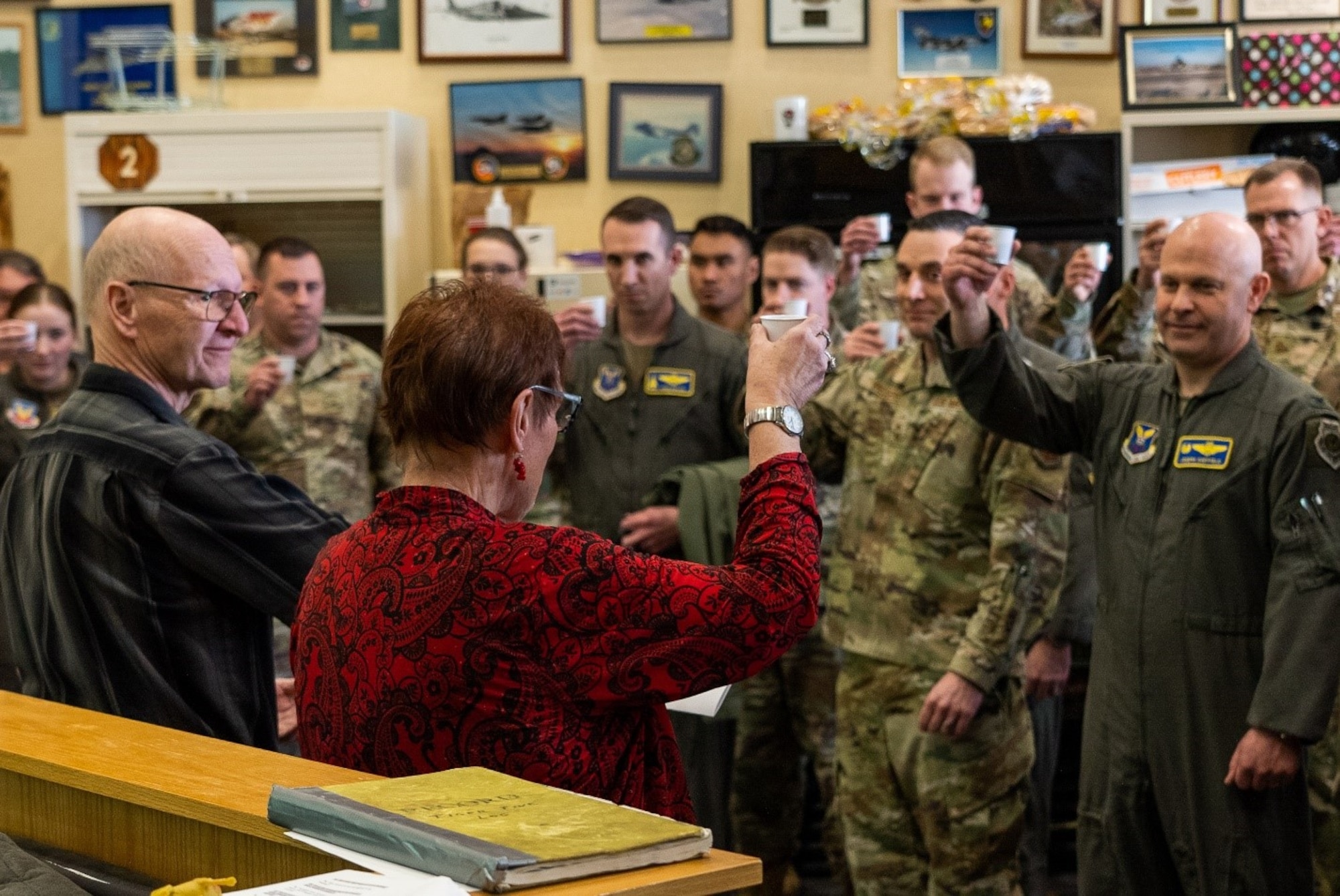 Mrs. Becky Thatcher-Keller, the daughter of Cpl. David J. Thatcher an original member of the Doolittle Raid, offers a toast in honor of the fallen crew members at Ellsworth Air Force Base, S.D., April 18, 2022.