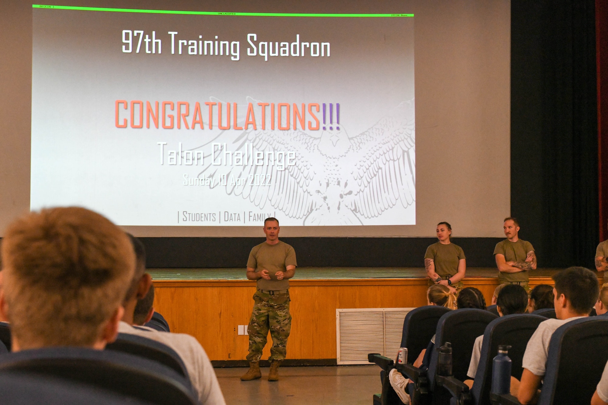 U.S. Air Force Lt. Col. Matthew Tarnowski, 97th Training Squadron commander, debriefs students after finishing the Talon Challenge at Altus Air Force Base, Oklahoma, April 10, 2022. The day’s events were designed to challenge the students both mentally and physically while building resilience they need to accomplish the 97th Air Mobility Wing mission. (U.S. Air Force photo by Airman 1st Class Trenton Jancze)