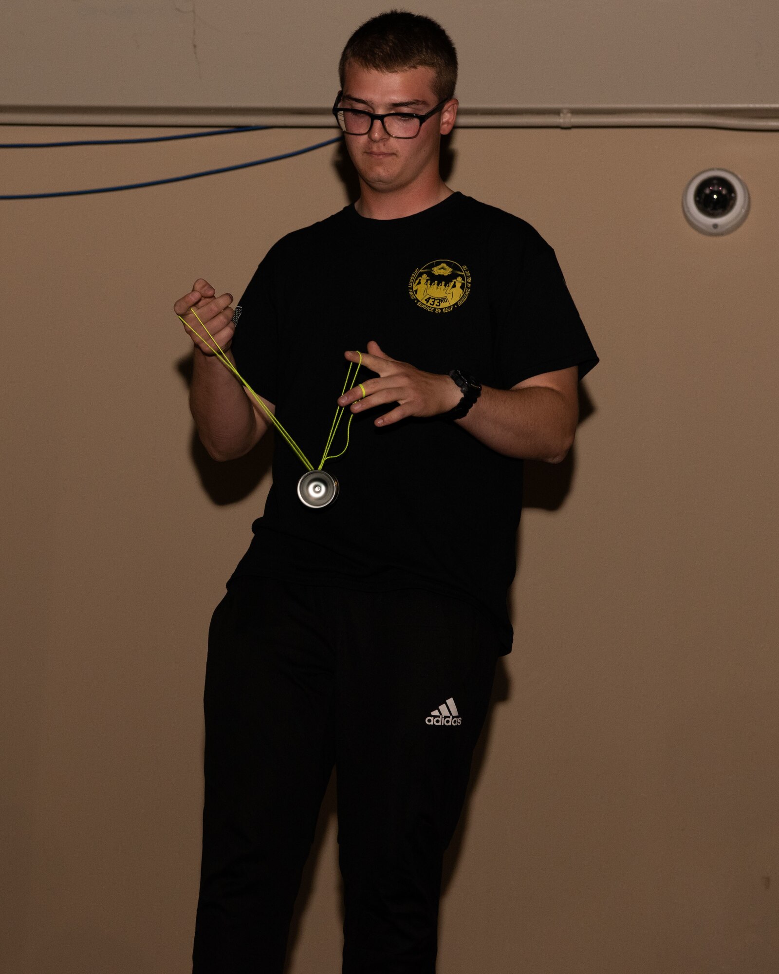U.S. Air Force Airman Scott Lilo, 312 Training Squadron student, performs a yo-yo trick routine at the Crossroads, Goodfellow Air Force Base, Texas, April 15, 2022. Lilo placed first during the competition. (U.S. Air Force photo by Senior Airman Michael Bowman)