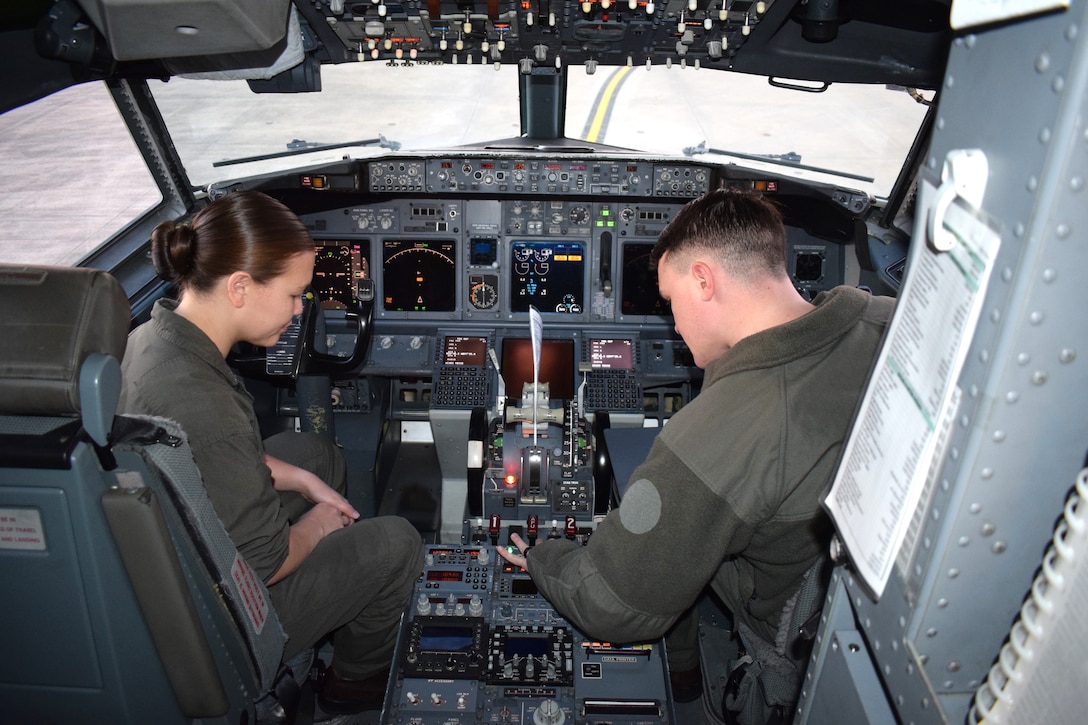 A Marine Corps C-40A Clipper crew chief instructs a C-40A crew chief student on preflight procedures at Naval Air Station Joint Reserve Base Fort Worth, Texas, March 31, 2022.