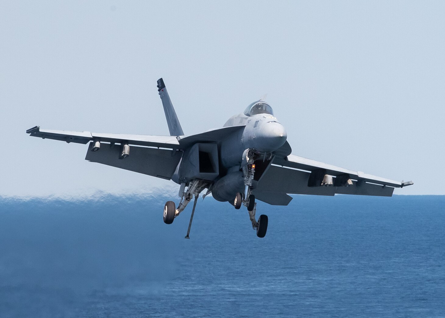 An F/A-18E Super Hornet, attached to the "Tomcatters" of Strike Fighter Squadron (VFA) 31, approaches the Gerald R. Ford-class aircraft carrier USS Gerald R. Ford’s (CVN 78) flight deck, April 11, 2022.