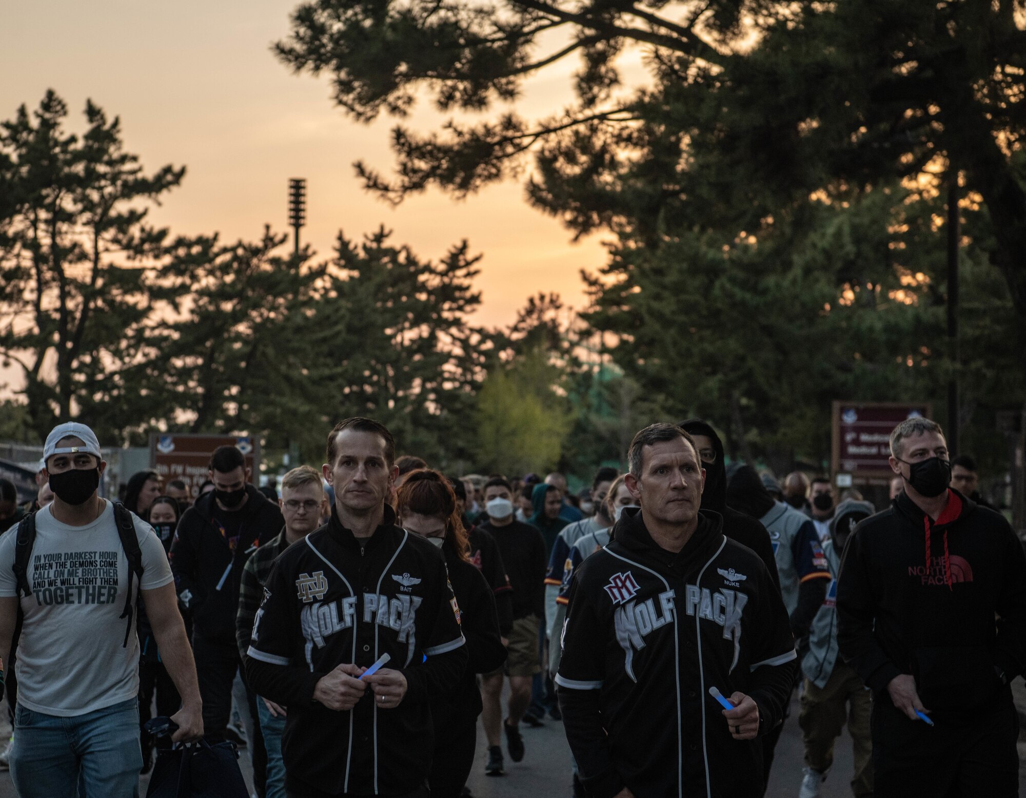 Airmen walk during a sexual assault prevention event.