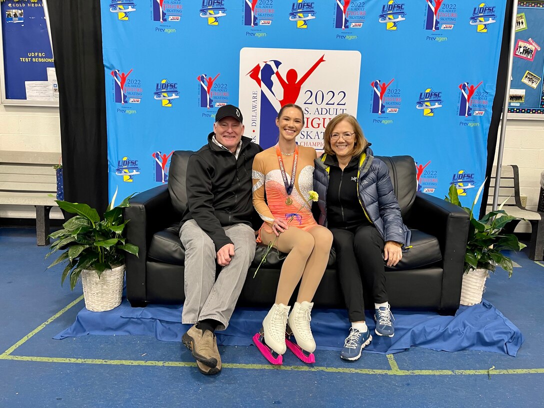 Marin Blaisdell, a materials engineer for the U.S. Army Engineer Research and Development Center's Cold Regions Research and Engineering Laboratory, sits with her parents George Blaisdell and Sharon Borland after her performance at the 2022 U.S. Adult Figure Skating National Championships held in Newark, Delaware, April 6-9, 2022.