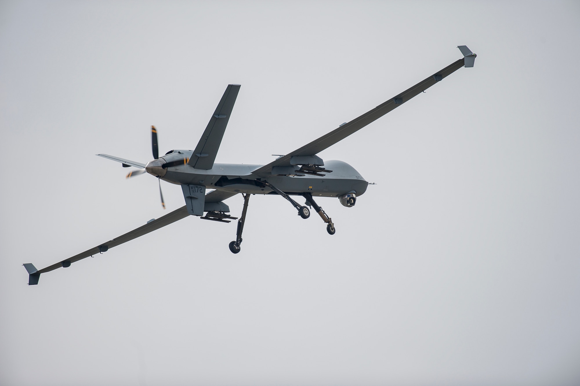 An MQ-9 Reaper performs a low pass during a first-ever air show demonstration May 29, 2016, at Cannon Air Force Base, N.M. The 2016 Cannon Air Show highlights the unique capabilities and qualities of Cannon's Air Commandos and also celebrates the long-standing relationship between the 27th Special Operations Wing and the High Plains community.  (U.S. Air Force photo/Master Sgt. Dennis J. Henry Jr.)