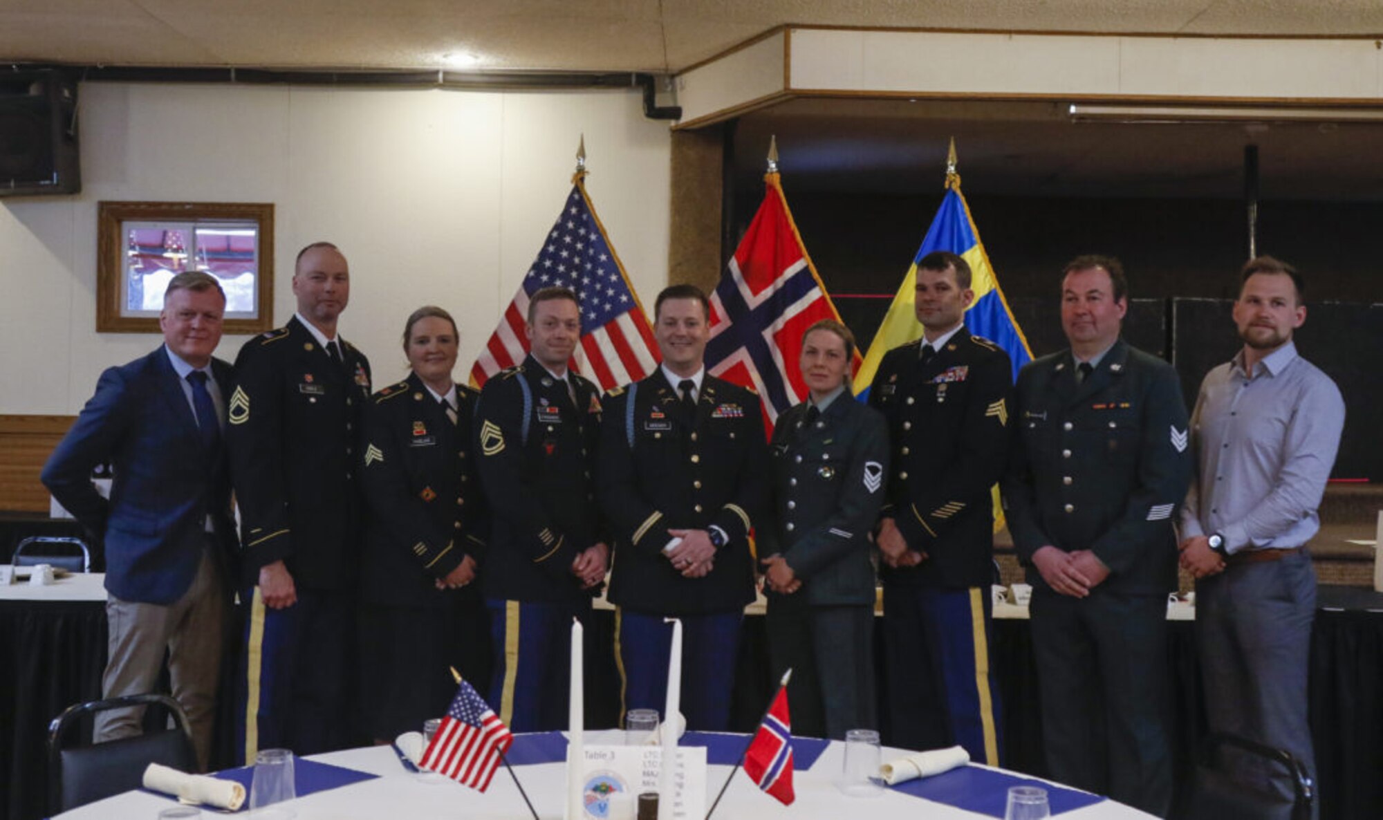 Participants of the 49th annual Norwegian Exchange, from the Norwegian Heimevernet, or Home Guard, and the Minnesota National Guard, community leaders, buddy weekend host families and distinguished guests joined for a farewell banquet, April 3, 2022, at the Falls Ballroom in Little Falls, Minnesota.