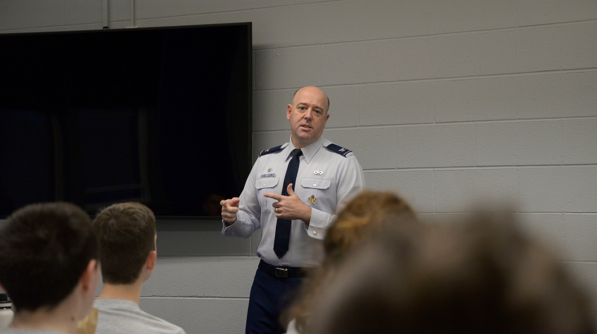 Col. Patrick Miller, 88th Air Base Wing and Wright-Patterson Air Force Base commander, speaks to cadets part of the Air Force Detachment 645 ROTC program April 14, 2022 at Ohio State University. College students interested in joining the Air Force or Space Force go through a four-year program which allow them to attend AFROTC classes along with other college courses to receive elective academic credit. (U.S. Air Force photo by Darrius Parker)