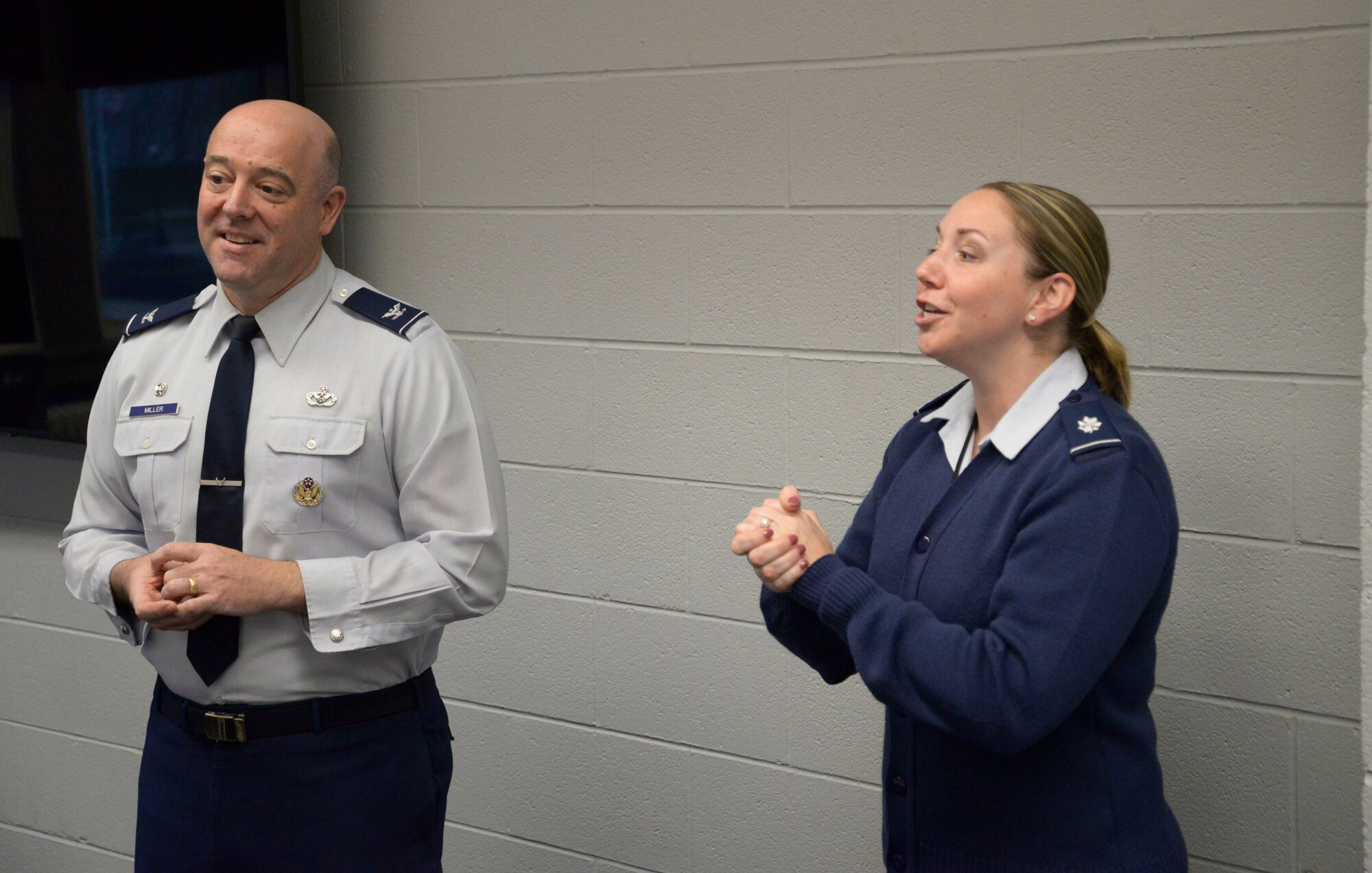 Col. Patrick Miller, 88th Air Base Wing and Wright-Patterson Air Force Base commander, and Lt Col. Emily Kubusek, Detachment 645 operations flight commander, inform the AFROTC cadets of their future military career and what they should expect pending graduation from the program April 14, 2022 at Ohio State University. College students interested in joining the Air Force or Space Force go through a four-year program which allow them to attend AFROTC classes along with other college courses to receive elective academic credit. (U.S. Air Force photo by Darrius Parker)