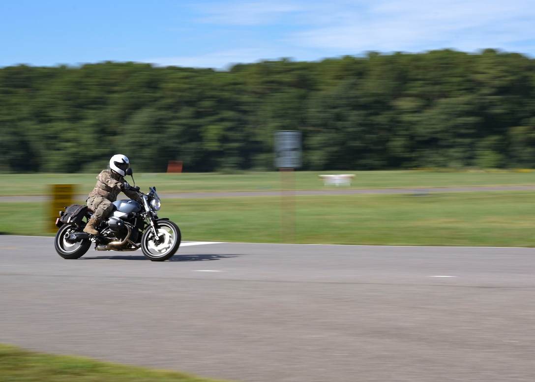 Airman riding motorcycle