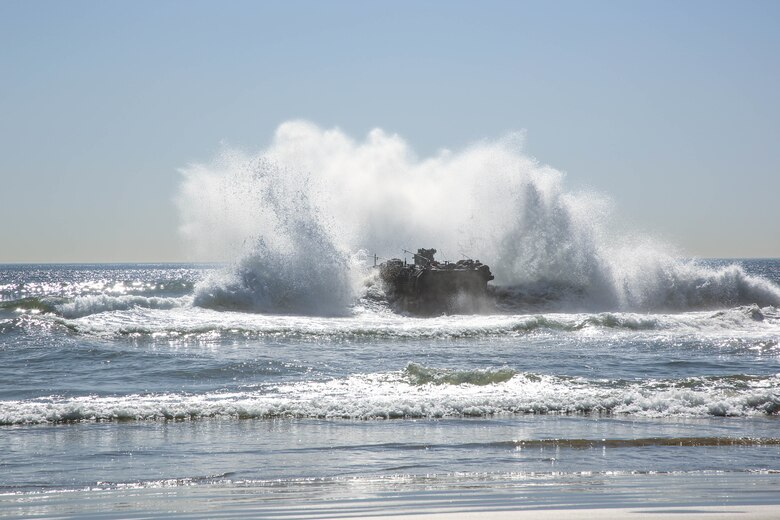 U.S. Marine Corps Amphibious Combat Vehicles conduct a shore-to-ship and ship-to-shore training exercise with embarked troops, demonstrating capability and competency during waterborne operations. (U.S. Marine Corps photo by Cpl. Quince Bisard)