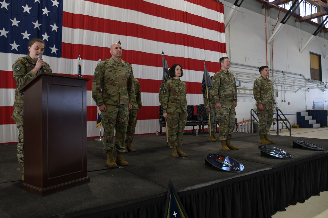 PETERSON SPACE FORCE BASE, Colo. – U.S. Space Force Col. Christopher Fernengel, Space Delta 3 – Space Electromagnetic Warfare commander, second from right, publishes the order to re-designate the 4th, 5th and 16th Space Control Squadrons to the 4th, 5th and 16th Electromagnetic Warfare Squadrons during their re-designation ceremony at Peterson Space Force Base, Colorado, April 15, 2022. The 4th Electromagnetic Warfare Squadron trains, equips, and mobilizes to employ space electromagnetic warfare capabilities in order to support full spectrum national security objectives. The 5th Electromagnetic Warfare Squadron provides combat-ready electromagnetic warfare forces to the commander, U.S. Space Command in order to protect and defend US and allied global operations. The 16th Electromagnetic Warfare Squadron provides combat-ready space warfighters to defend the space domain with space control systems for our Nation, the Joint Force and allies. (U.S. Space Force photo by Airman 1st Class Aaron Edwards)