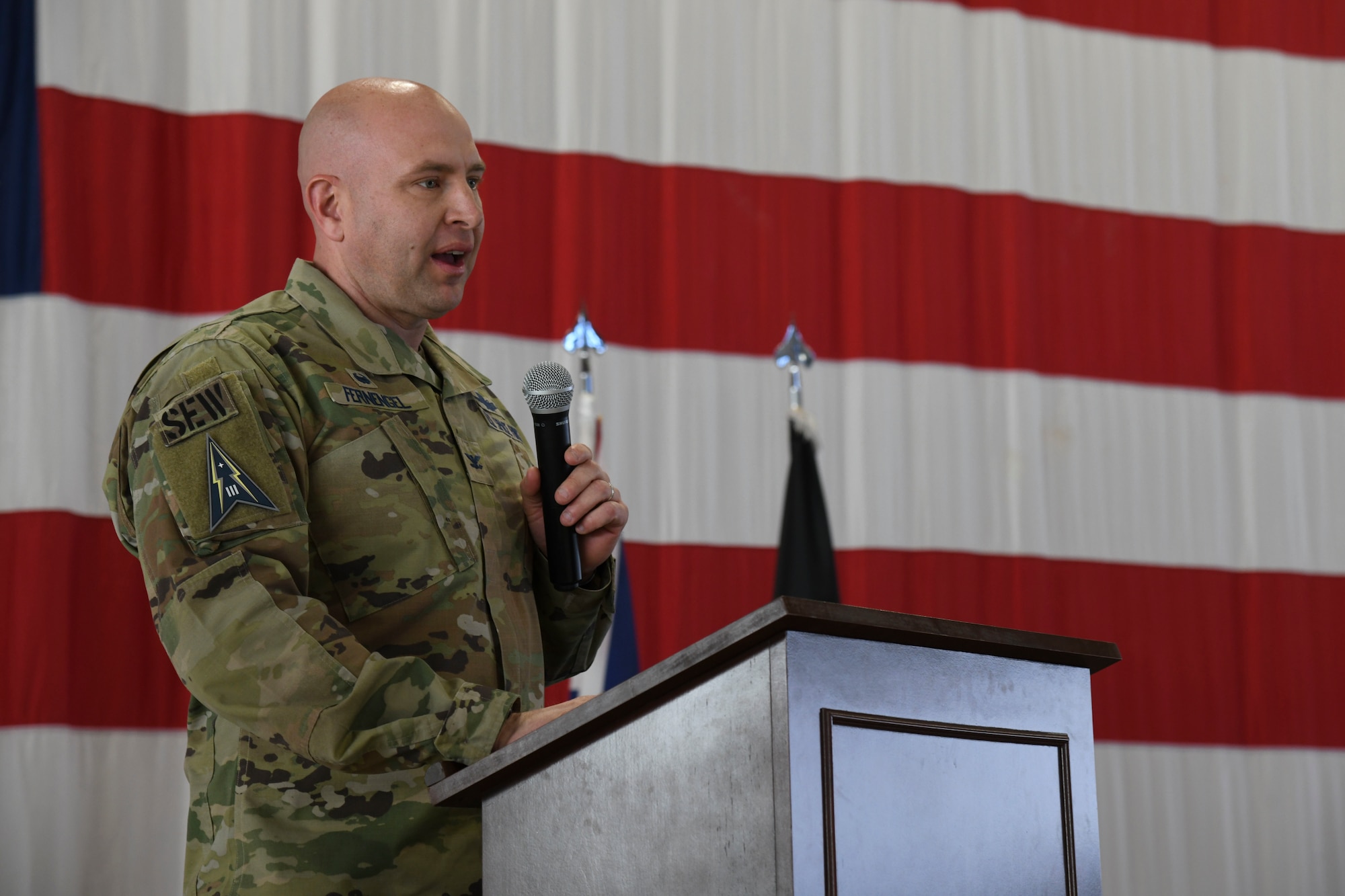 PETERSON SPACE FORCE BASE, Colo. – U.S. Space Force Col. Christopher Fernengel, Space Delta 3 – Space Electromagnetic Warfare commander, addresses the audience during the 4th, 5th and 16th Space Control Squadron re-designation ceremony at Peterson Space Force Base, Colorado, April 15, 2022. DEL 3 is responsible for executing premiere Space Electronic Warfare through sustainable operations to dominate the space domain. (U.S. Space Force photo by Airman 1st Class Aaron Edwards)