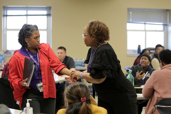 Ariesa Evans, left, assigned to the 85th U.S. Army Reserve Support Command’s 3rd Regiment, 338th Battalion, role plays as an overwhelmed co-worker battling issues such as substance abuse, at the Command’s Stand for Life suicide prevention training event in Nashville, Tennessee, March 28 – 30, 2022.