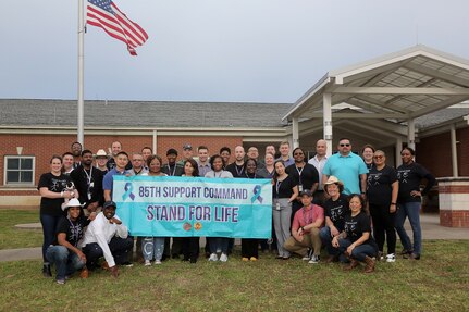 Suicide prevention liaisons take a class photo with their trainers during the 85th U.S. Army Reserve Support Command’s Stand for Life suicide prevention training event in Nashville, Tennessee, March 28 – 30, 2022.