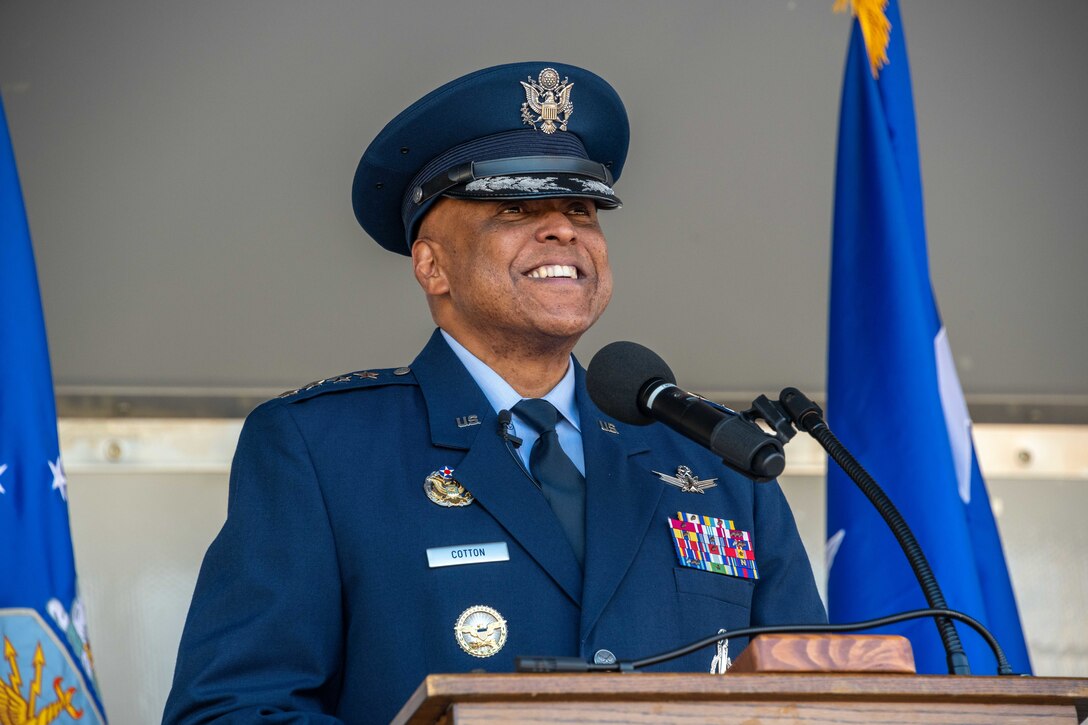 Enlisted Airmen of Air Education and Training Command induct Gen. Anthony Cotton, Commander, U.S. Air Force Global Strike Command and Commander, Air Forces Strategic-Air, U.S. Strategic Command, into the AETC Order of the Sword in a ceremony.