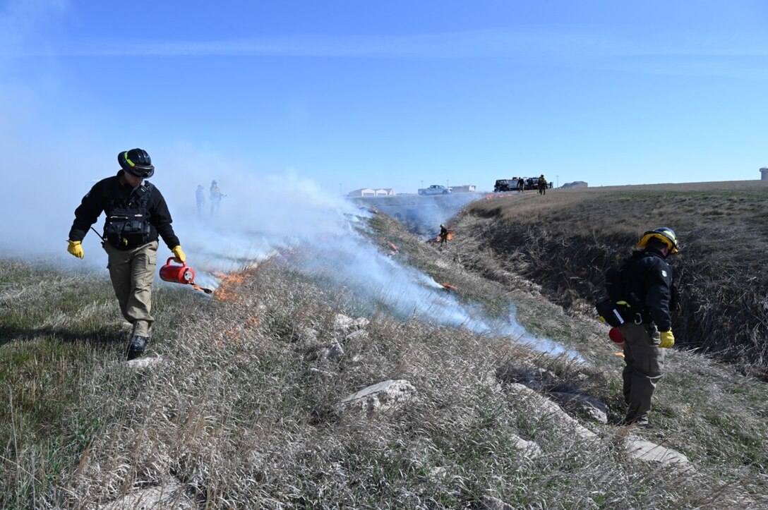 Firefighters from the 28th Civil Engineer Squadron and the Rapid City area conduct a prescribed burn on Ellsworth Air Force Base, S.D., April 16, 2022.