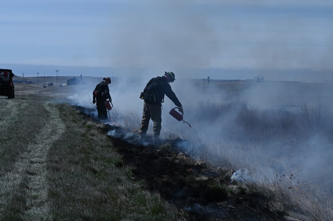 Firefighters from the 28th Civil Engineer Squadron and the surrounding area conduct prescribed burns near the airfield at Ellsworth Air Force Base, S.D., April 16, 2022.