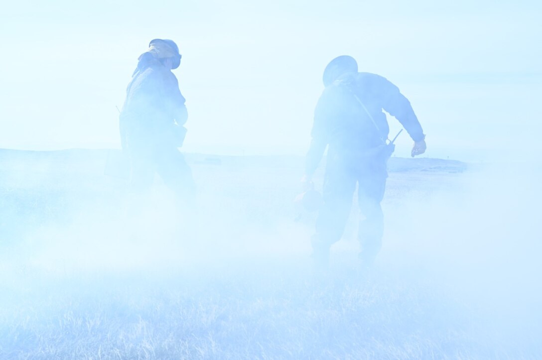 Firefighters from the 28th Civil Engineer Squadron and the Rapid City community conduct a prescribed burn on Ellsworth Air Force Base, S.D., April 16, 2022.