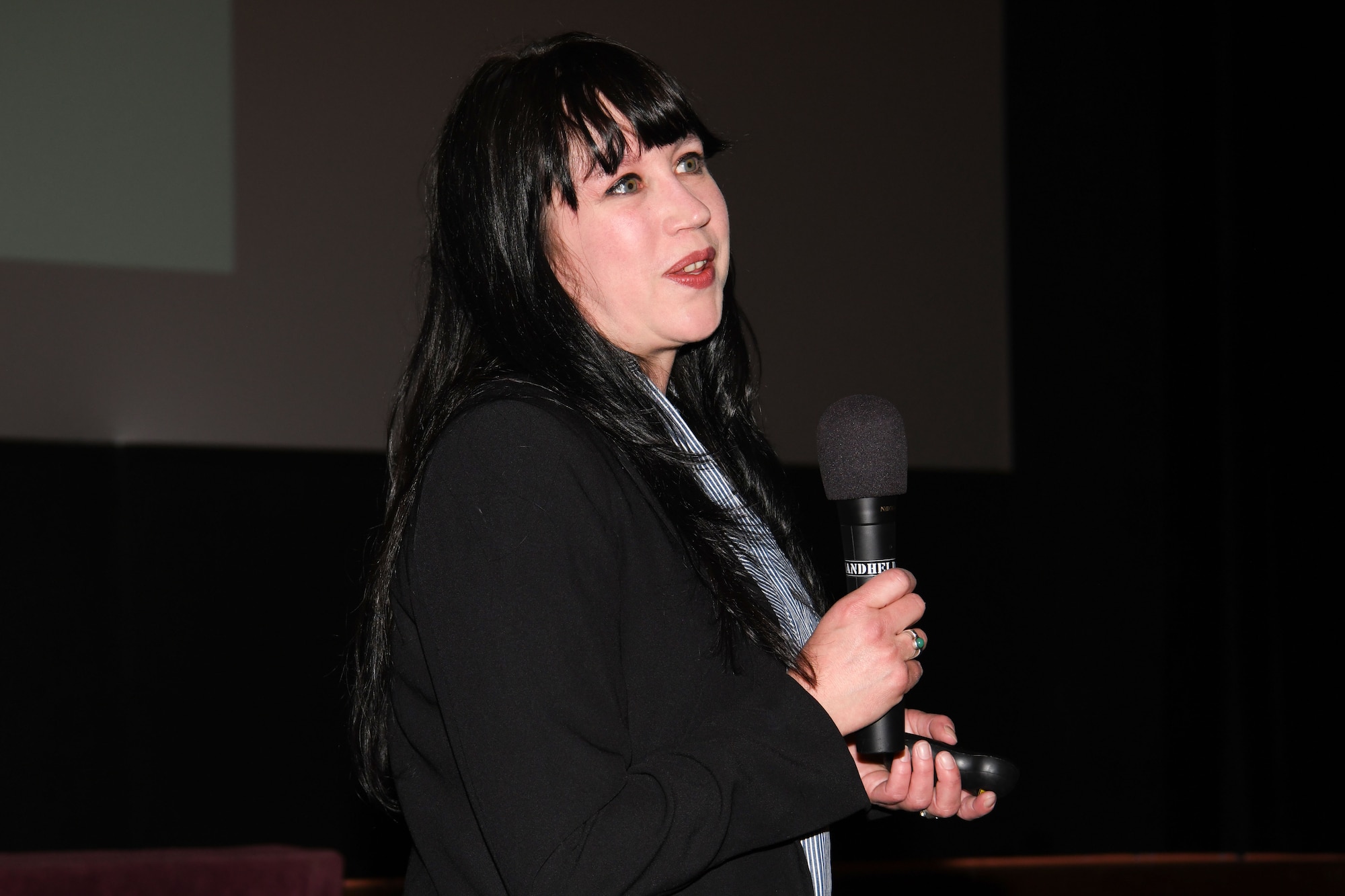 Anna Nasset, a stalking survivor, speaks about her experience at the base theater on F. E. Warren Air Force Base, Wyoming, April 14, 2022. She spoke to spread awareness on the issue during Sexual Assault Awareness Month. (courtesy photo)