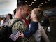A sailor assigned to the “Gauntlets” of Electronic Attack Squadron (VAQ) 136 greets his family after returning to Naval Air Station Whidbey Island, Washington, Feb 14, following an eight-month deployment to U.S. 3rd and 7th Fleet areas of operations as part of the Carl Vinson Carrier Strike Group.