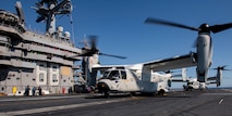 Three CMV-22B Osprey's, from the "Sunhawks" of Fleet Logistics Multi-Mission Squadron (VRM) 50, rest after landing on the flight deck of the aircraft carrier USS Nimitz (CVN 68). Nimitz is underway conducting routine operations.