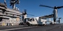 Three CMV-22B Osprey's, from the "Sunhawks" of Fleet Logistics Multi-Mission Squadron (VRM) 50, rest after landing on the flight deck of the aircraft carrier USS Nimitz (CVN 68). Nimitz is underway conducting routine operations.