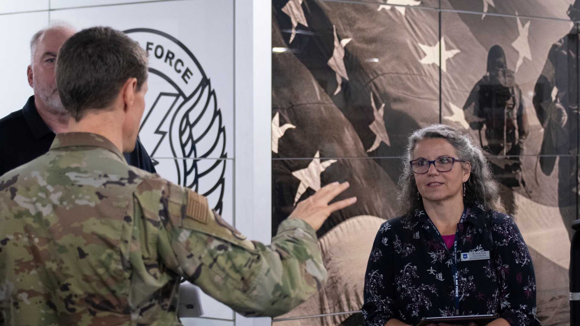 U.S. Air Force Col George Buse (left), Special Warfare Human Performance Support Group commander, briefs Dr. Wendy Walsh (right), Air Education and Training Command chief learning officer, on how members of the Special Warfare Training Wing leverage cutting-edge human performance technology at the SWTW interim Human Performance Training Center at Joint Base San Antonio-Chapman Training Annex, Texas, April 5, 2022. Walsh and her team participated in an immersion tour of the SWTW to learn about how the SWTW builds Air Force Special Warfare Airmen and prepares them for combat.