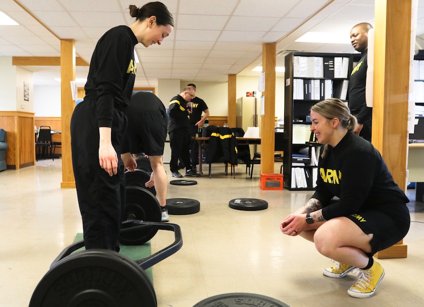 Alyssa, a Senior Airman with the 22nd Intelligence Squadron, prepares to  complete a set number of resistance-band deadlifts during her training at  the Gaffney Fitness Center Feb. 6, 2016 at Fort George