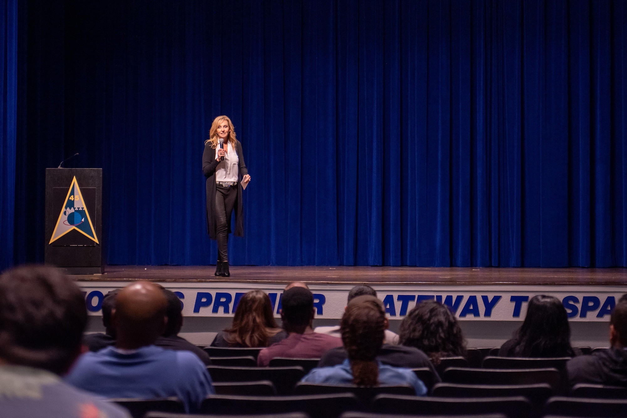 Elaine Larsen, a two-time world champion drag racer, talks about overcoming challenges April 15, 2022, during Resilience Day at Patrick Space Force Base, Florida. Larsen was one of two guest speakers at the event. (U.S. Space Force photo by Deanna Murano)