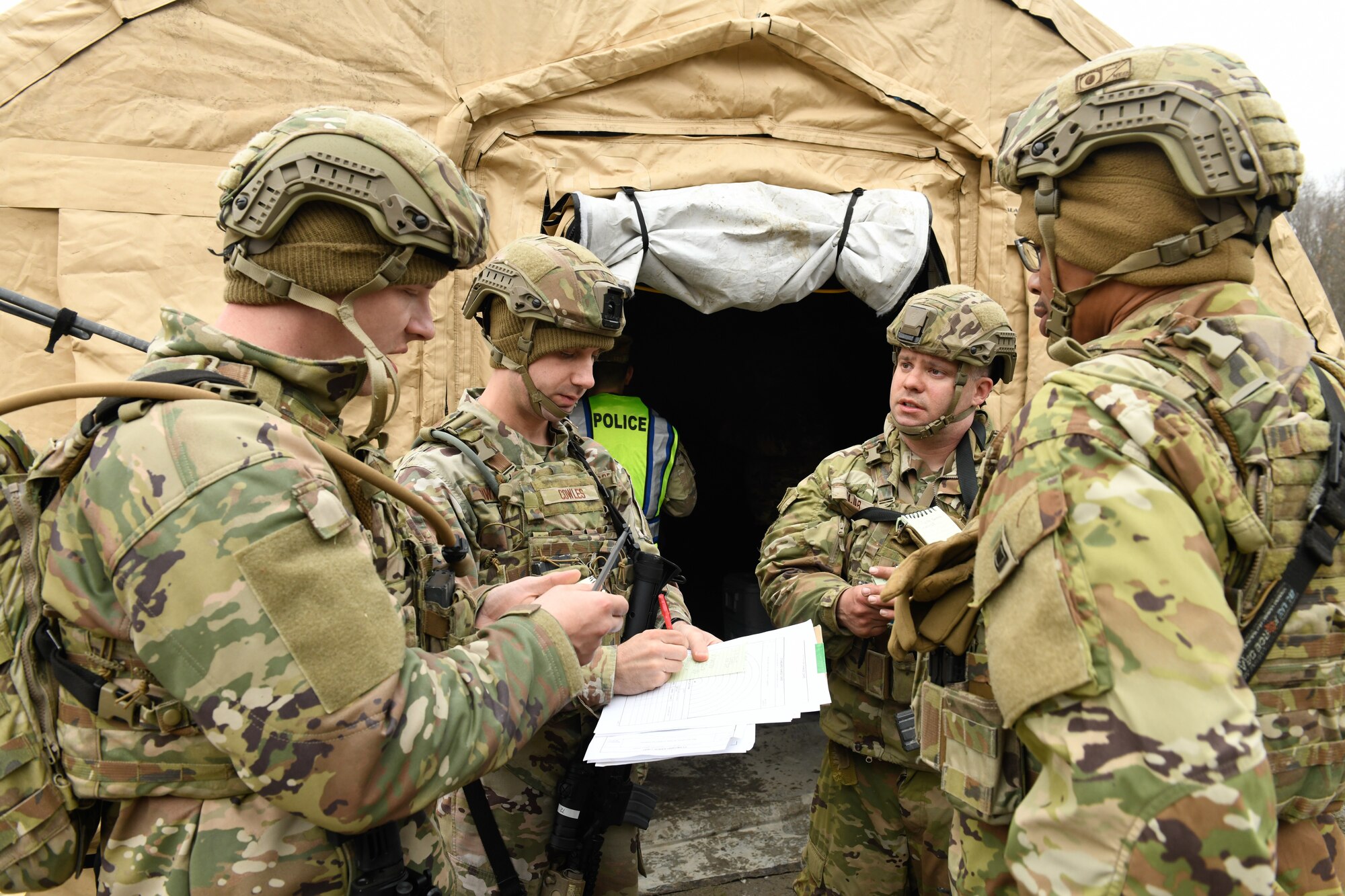 The 910th Civil Engineer Squadron joined the 910th Security Forces Squadron for a 24-hour field exercise in which the units established a bare base and provided perimeter defense, March 31 to April 1, 2022.