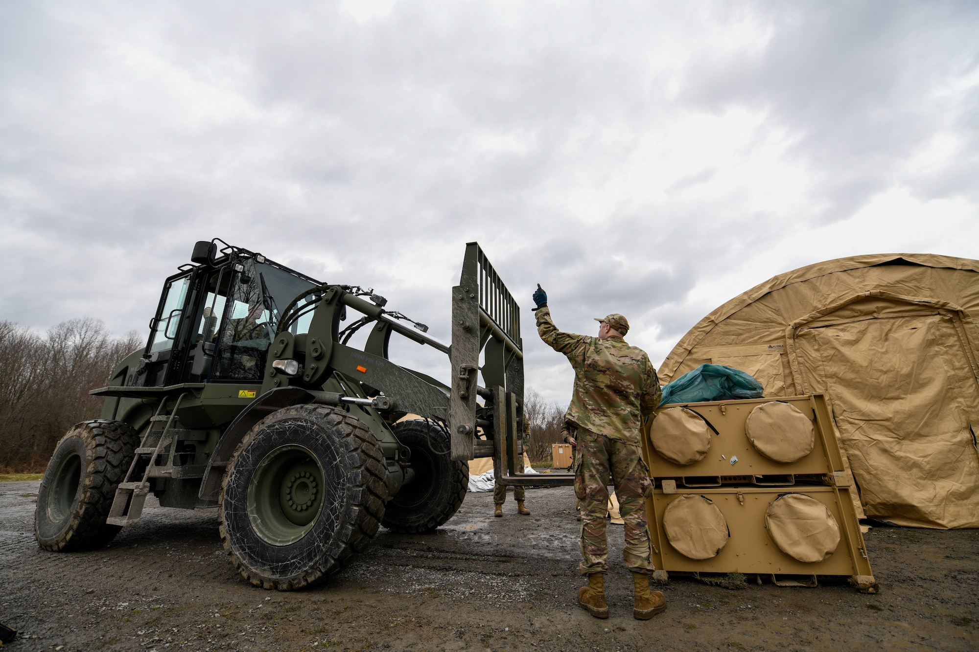 The 910th Civil Engineer Squadron joined the 910th Security Forces Squadron for a 24-hour field exercise in which the units established a bare base and provided perimeter defense, March 31 to April 1, 2022.