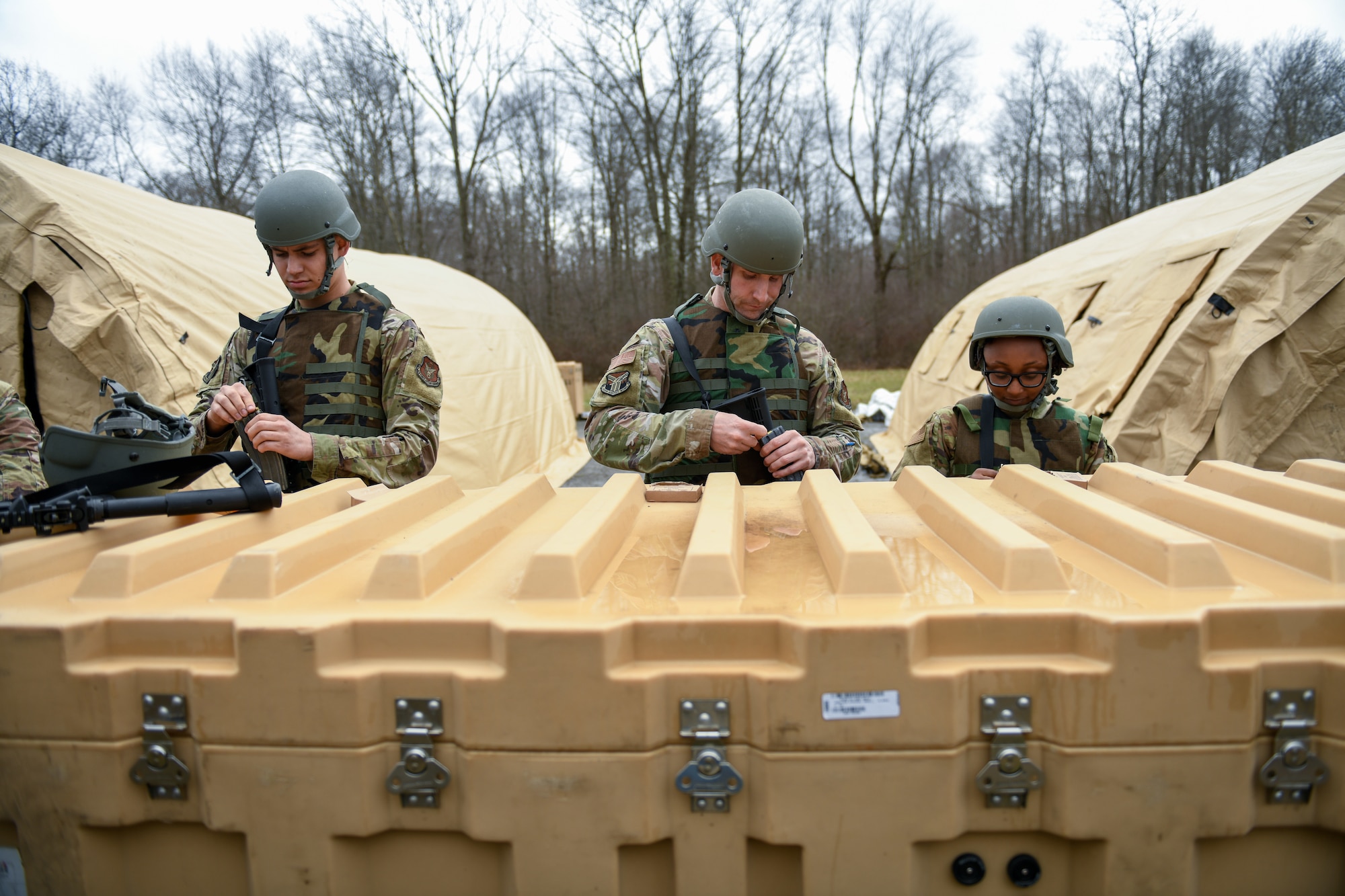 The 910th Civil Engineer Squadron joined the 910th Security Forces Squadron for a 24-hour field exercise in which the units established a bare base and provided perimeter defense, March 31 to April 1, 2022.