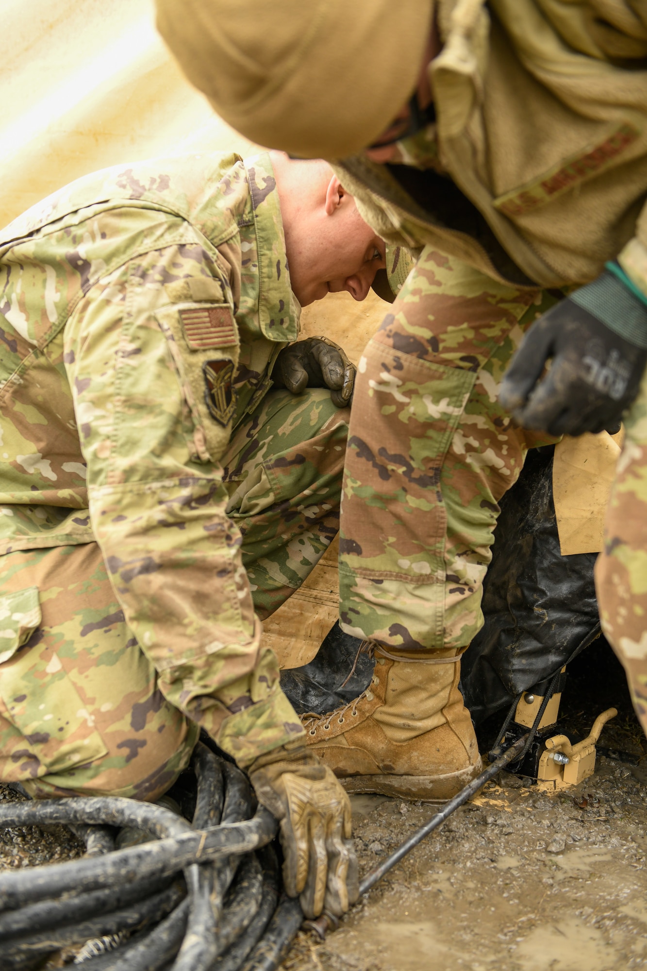 The 910th Civil Engineer Squadron joined the 910th Security Forces Squadron for a 24-hour field exercise in which the units established a bare base and provided perimeter defense, March 31 to April 1, 2022.