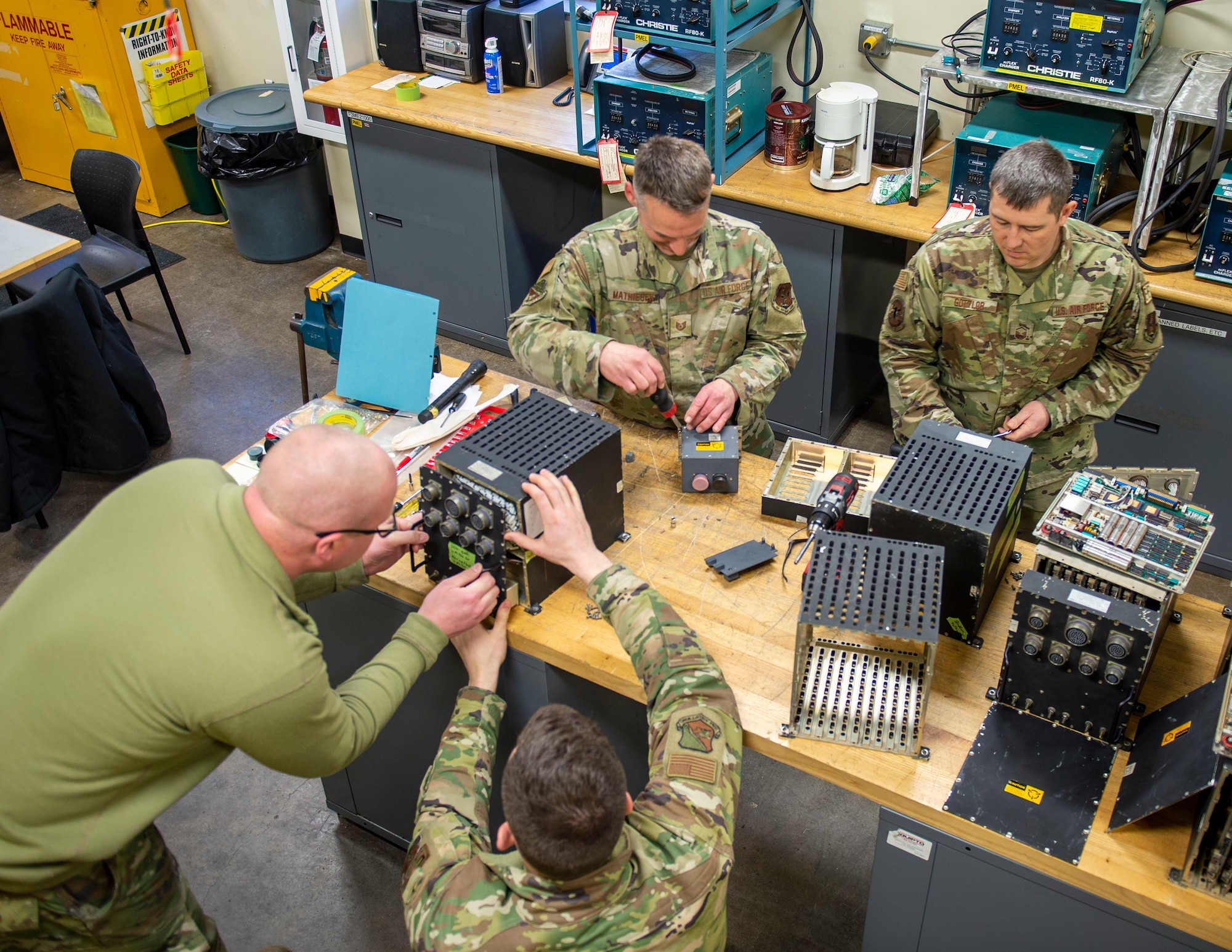 U.S. Air Force Airmen from five different maintenance squadrons came together to repair aging lighting control units for their C-130 H3 Hercules fleet in St. Paul, Minn., April 7, 2022.