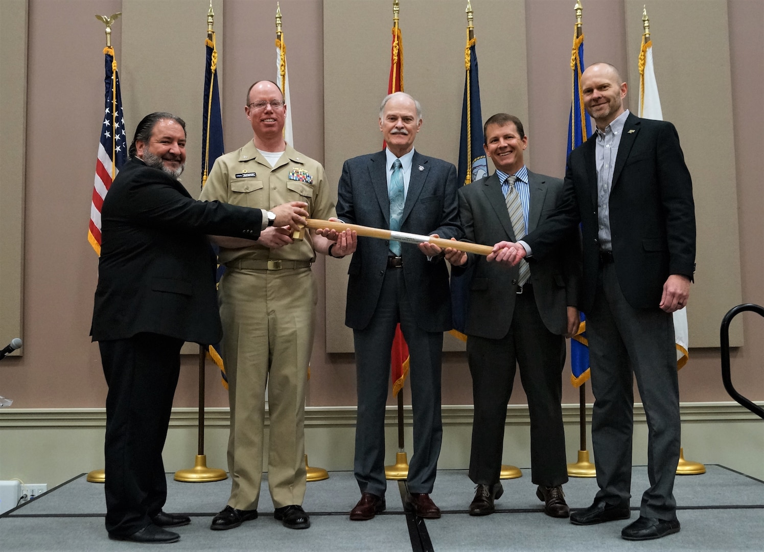 Left to right:  Mr. Greg Deason, Purdue Research Foundation; CAPT McKay, Commanding Officer, NSWC Crane; Mr. John Mensch, President, WestGate Authority; Dr. Kyle Werner, Deputy Technical Director, NSWC Crane; and Dr. Jason Salstrom, Purdue Research Foundation.