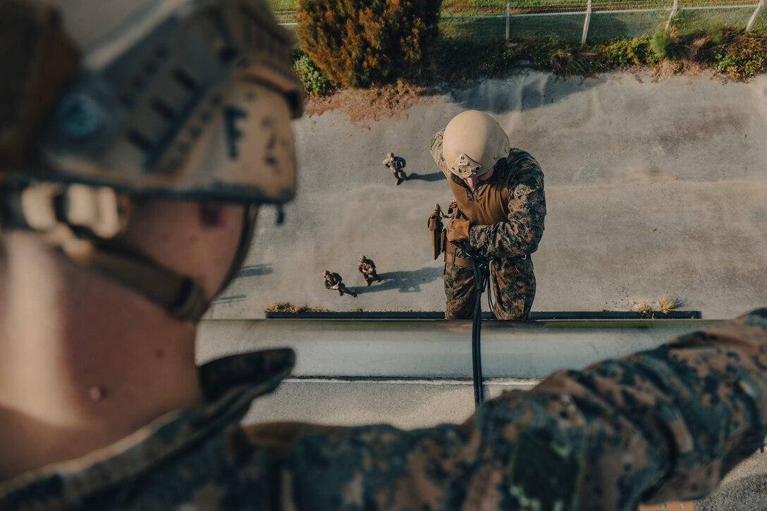 U.S. Reconnaissance Marines with Maritime Raid Force, 31st Marine Expeditionary Unit, rappel down a tower during Helicopter Rope Suspension Technique training on Camp Schwab, Okinawa, Japan, April 11, 2022. Reconnaissance Marines practice a multitude of infiltration techniques to access any area of operation around the globe. The 31st MEU, the Marine Corps’ only continuously forward-deployed MEU, provides a flexible and lethal force ready to perform a wide range of military operations as the premier crisis response force in the Indo-Pacific region.