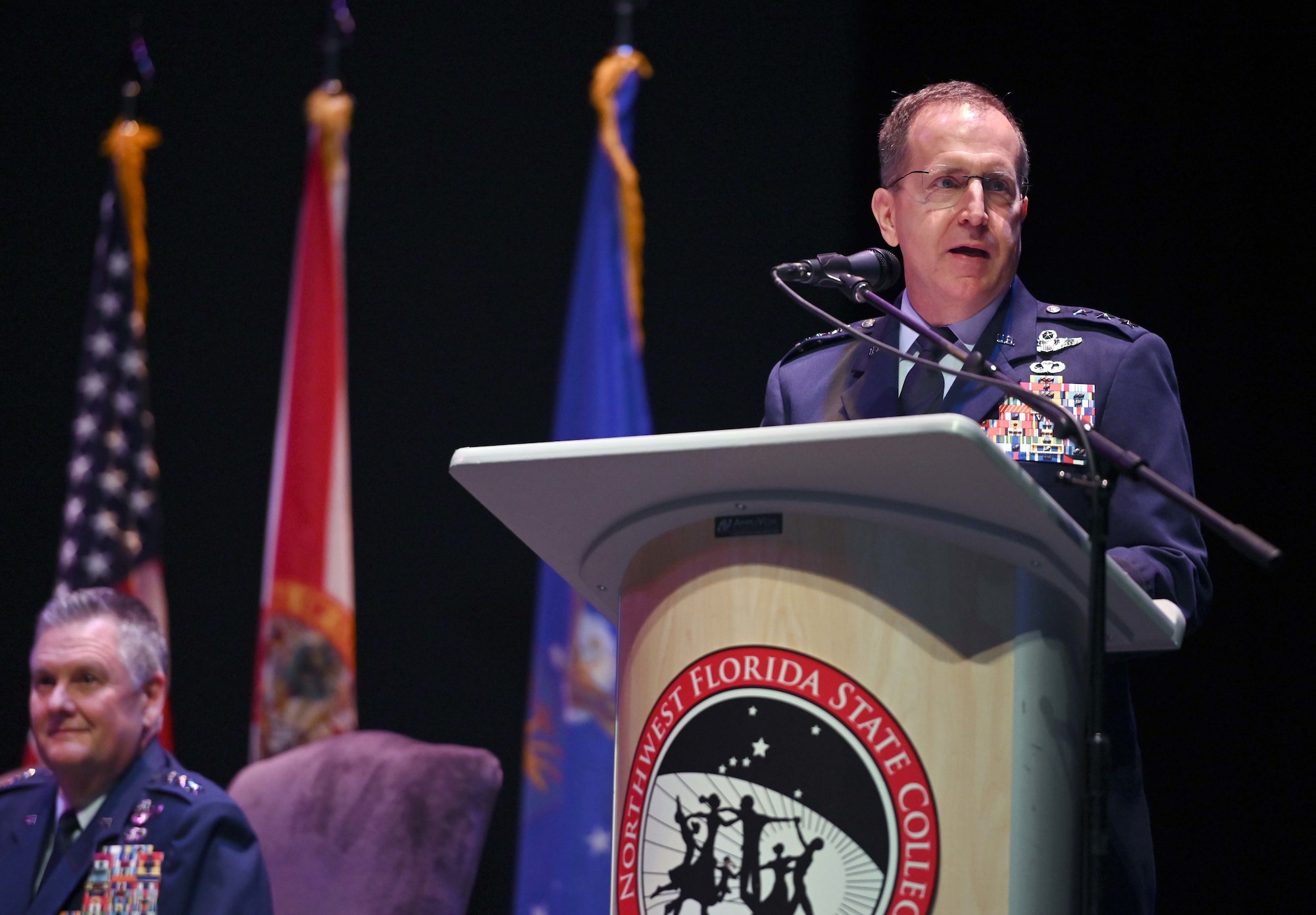 U.S. Air Force Lt. Gen. Jim Slife, commander of Air Force Special Operations Command, tells the history of the Doolittle Raider Goblets during the Doolittle Raider Goblet Ceremony at the Mattie Kelly Arts Center at Northwest Florida State College, Niceville, Florida, April 18, 2022. The goblets, each engraved with the names of the members of the historic raid, are on permanent display at the National Museum of the U.S. Air Force, at Wright Patterson Air Force Base, Ohio. (U.S. Air Force photo by Staff Sgt. Brandon Esau)